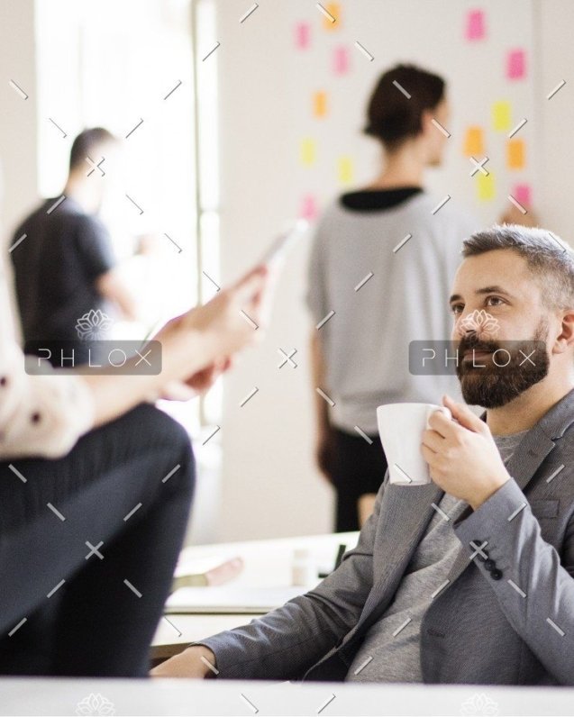 demo-attachment-438-business-people-with-wheelchair-in-the-office-P9M4RX3